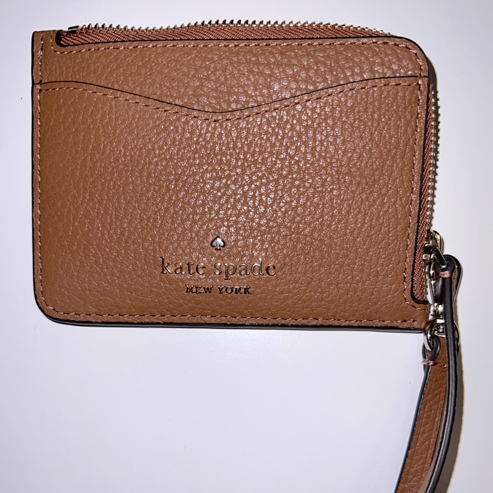 Kate Spade small card holder with strap and zipper pocket.